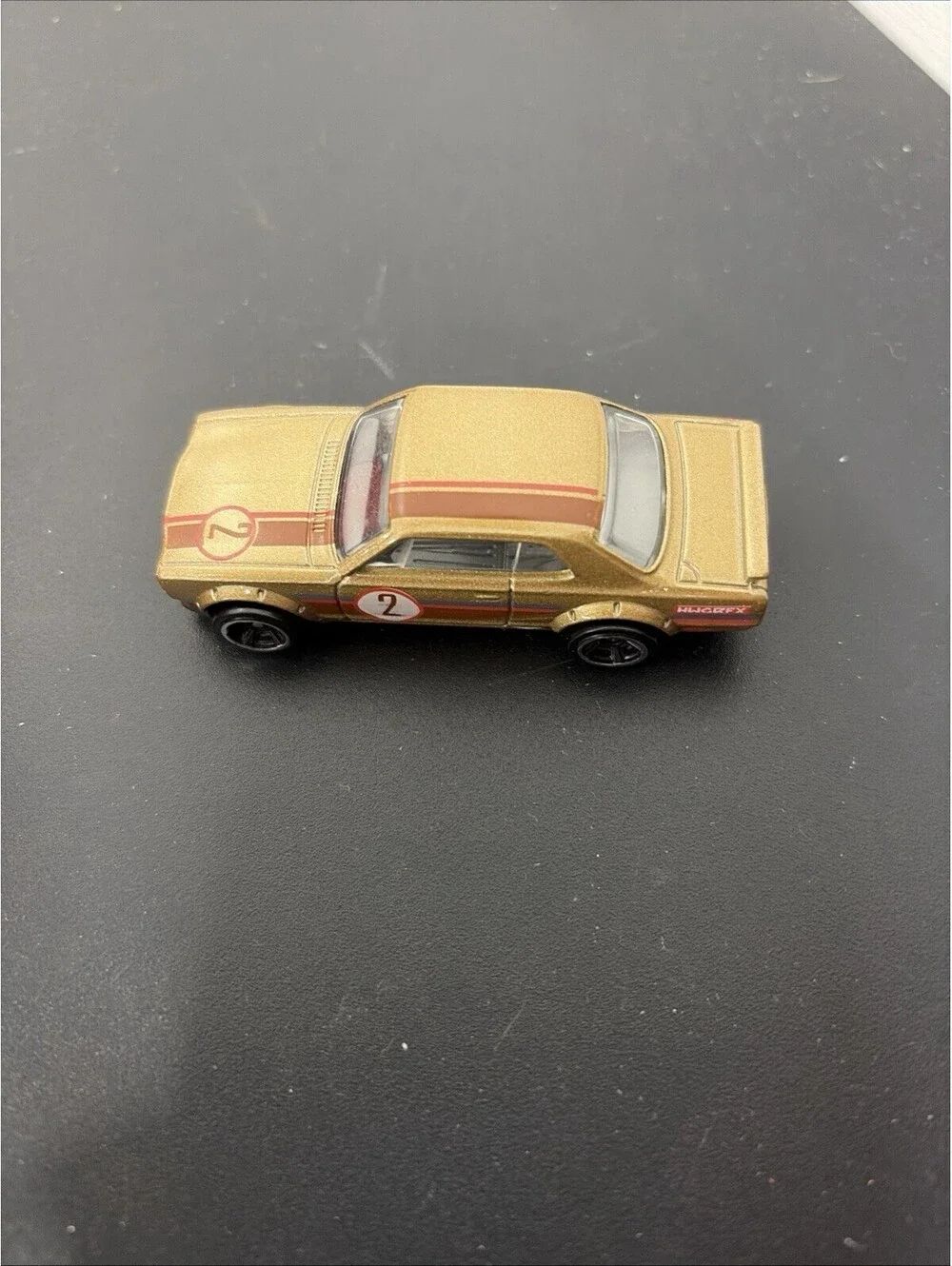 2011 Hot Wheels Nissan Skyline H/T 2000GT-X Gold Nightburnerz